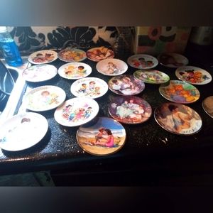 Vintage precious moments 22k gold trim plates from 1984-2004.